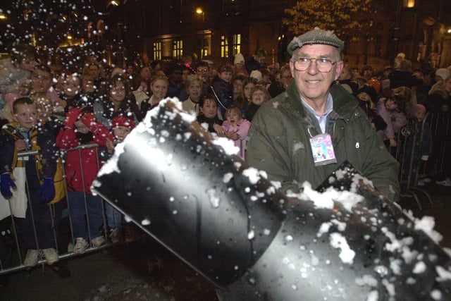 Snow man Alan Oldfield with his snow machine at the 2001 switch on
