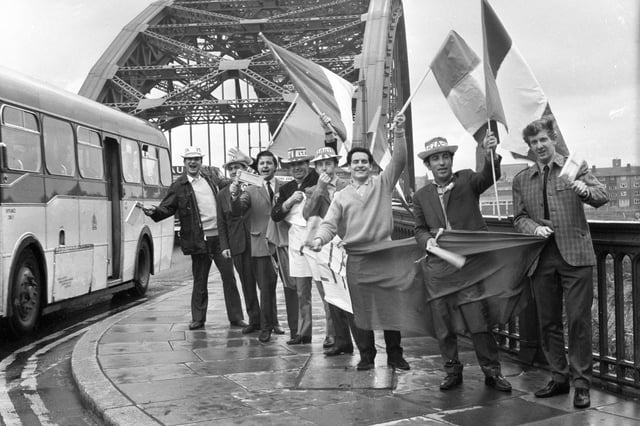 Hundreds of Italians surged  through Sunderland yesterday waving flags, blowing horns, shaking rattles and shouting slogans.  One flag bearing crowd of Italians were waiters from an hotel in Keswick who had travelled to Sunderland for the day.