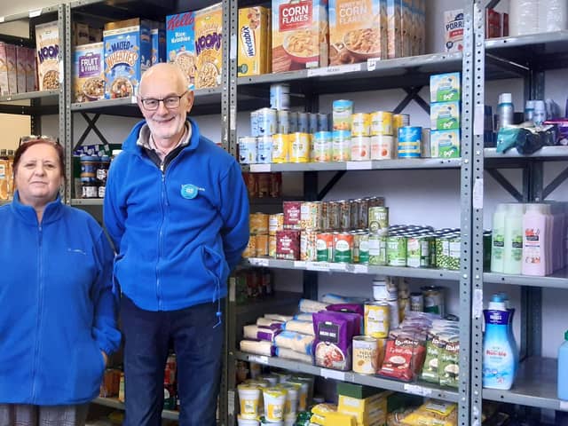 Coordinator of S2 Food Bank Sue Rose and John Hull, chair of the trustees in the new community shop on Cary Road.