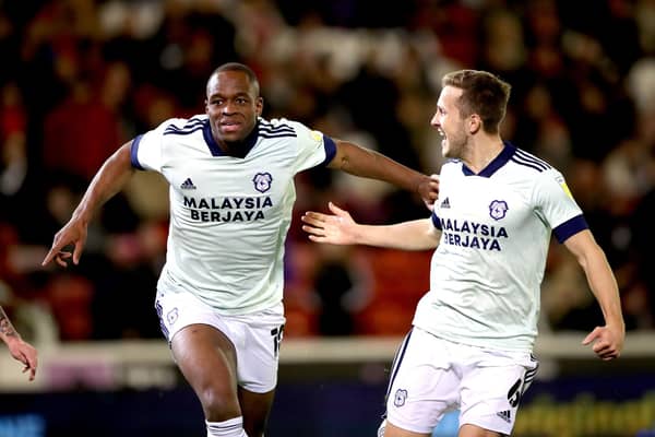 Cardiff City's Uche Ikpeazu (left) celebrates scoring their side's first goal of the game during the Sky Bet Championship match at Oakwell Stadium, Barnsley. Picture date: Wednesday February 2, 2022. PA Photo. See PA story SOCCER Barnsley. Photo: Isaac Parkin/PA Wire.