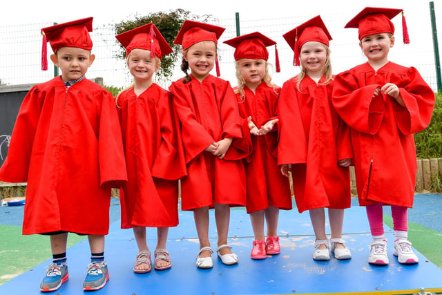 Children leaving Kiddikins Nursery on the Central Estate held a graduation ceremony. Pictured, from left, are Zac Hopper, Maizy Redshaw, Poppy Cawley, Ella Simpson, Amily Heithington (CORR) and Cery's (CORR) Southcott.