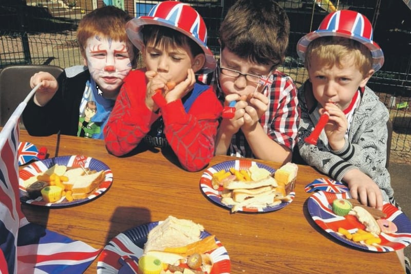 These four young lads were clearly enjoying the food on offer at the party thrown by Hucknall Pre-School Playgroup at Hucknall National Primary School
