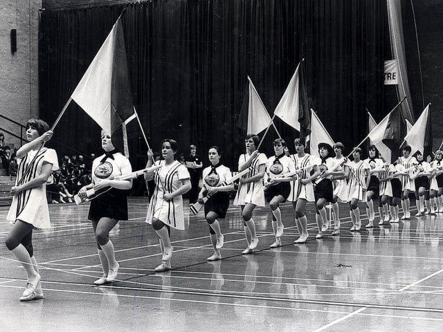"Shades of Blue" team of the Shades of Blue Bugle Corps of the Girls Venture Corps of 367 ATC Squadron, Sheffield, at a Colour Guard contest at Concord Sports Centre, Sheffield, Feb 13th 1982