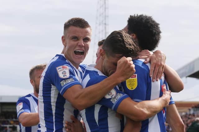 Hartlepool United's Will Goodwin celebrates after Tyler Burey scored  their first goal during the Sky Bet League 2 match between Hartlepool United and Walsall at Victoria Park, Hartlepool on Saturday 21st August 2021. (Credit: Mark Fletcher | MI News)