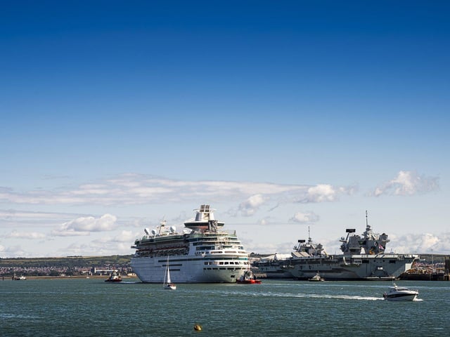 The cruise ship meets another giant vessel