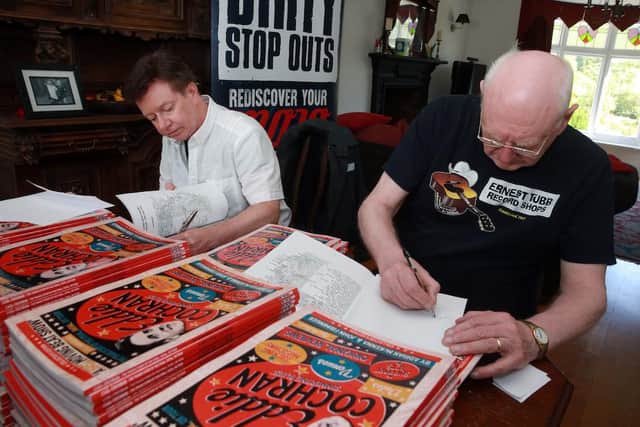 Adrian McKenna and John Firminger signing copies of their book about roll n role star Eddie Cochran, Sheffield, United Kingdom, 30th May 2021. Photo by Glenn Ashley.