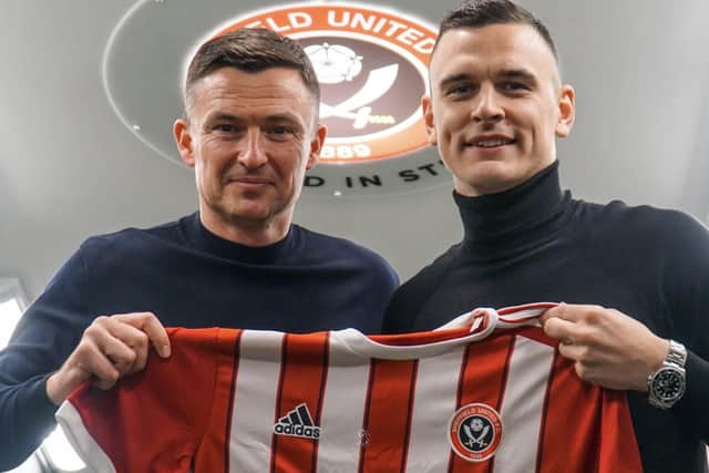 Sheffield United manager Paul Heckingbottom with Filip Uremovic