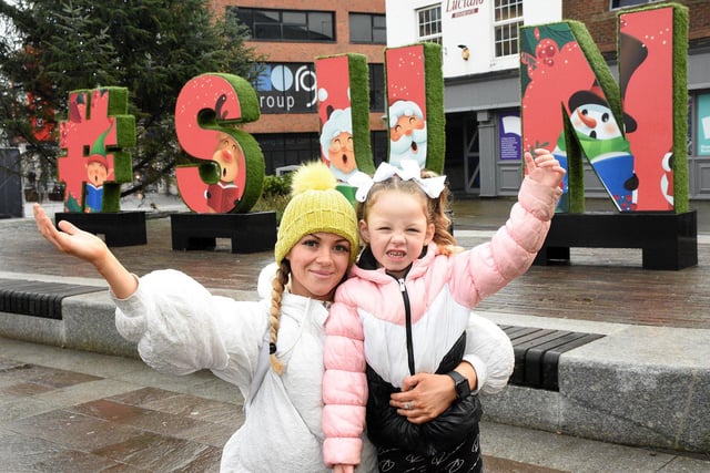 Chloe Laws and her daughter Ivy-Rose, four, are dressed to keep warm as they enjoy their Christmas shopping in Keel Square.