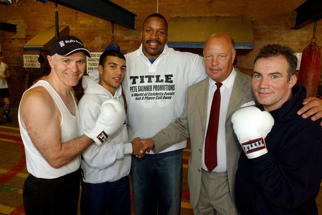 Pete Skinner, second from right, called into Brendon Ingle's Newman Road gym to sponsor one of up his and coming boxers, Esham Pickering, second left.  Left to right are, Brendan, Esham Pickering, ex world champ Tim Witherspoon, Pete Skinner and John Daly, September 2003