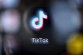 These are the TikTok trends and dances, including 'Learn with TikTok' and 'Sea Shanty', which could make you the most money, according to money.co.uk. Photo by KIRILL KUDRYAVTSEV/AFP via Getty Images.