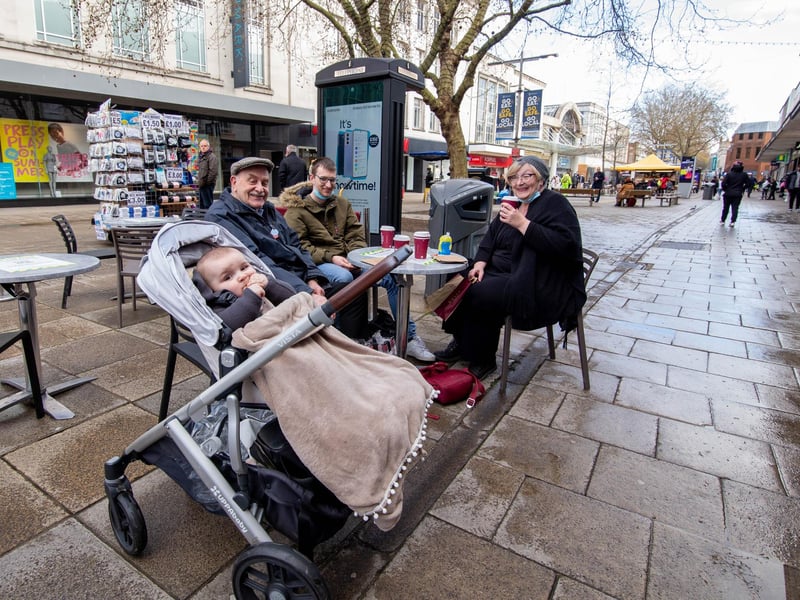 Oscar 8 months, Bob Allen, Tom Walker and Tracey Goddard enjoying a meal outside Costa, Commercial Road, Portsmouth on 12 April 2021. Picture: Habibur Rahman