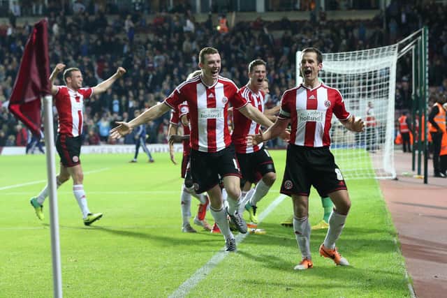 Michael Doyle celebrates with his Sheffield United team mates after a cup win over West Ham in August 2014. Picture: Blades Sports Photography
