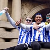 Sheffield Wednesday's George Byers, Liam Palmer and Callum Paterson celebrate their promotion to the Sky Bet Championship at Sheffield Town Hall following an open top bus parade. Sheffield Wednesday secured their promotion to the Championship after Josh Windass scored in injury time at the end of extra-time of the play-off final. Picture date: Wednesday May 31, 2023. PA Photo. See PA story SOCCER Sheff Wed. Photo credit should read: Richard Sellers/PA Wire.RESTRICTIONS: Use subject to restrictions. Editorial use only, no commercial use without prior consent from rights holder.