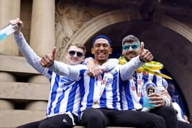 Sheffield Wednesday's George Byers, Liam Palmer and Callum Paterson celebrate their promotion to the Sky Bet Championship at Sheffield Town Hall following an open top bus parade. Sheffield Wednesday secured their promotion to the Championship after Josh Windass scored in injury time at the end of extra-time of the play-off final. Picture date: Wednesday May 31, 2023. PA Photo. See PA story SOCCER Sheff Wed. Photo credit should read: Richard Sellers/PA Wire.

RESTRICTIONS: Use subject to restrictions. Editorial use only, no commercial use without prior consent from rights holder.