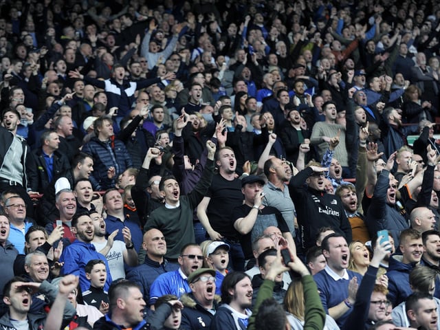 A full away end in full voice at Oakwell as Sheffield Wednesday fans celebrate in 2017
