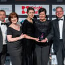 Leon Newth, Lisa Trybus, Karen Prins, Linda Hodges and Paul Manning collecting the award 