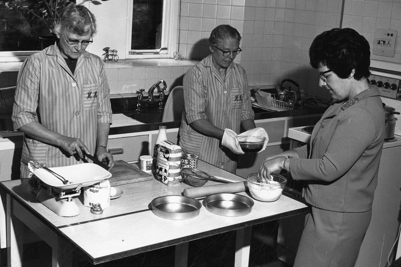 Cooks preparing food for the Sheffield Meals on Wheels service in the 1970s. Ref no: u10467