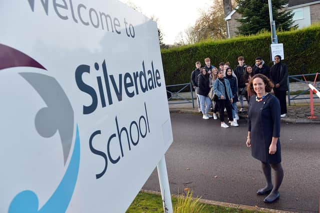 Silverdale School wins Top State School of the North for the decade. Pictured is headteacher teacher Sarah Sims with Sixth Form students.