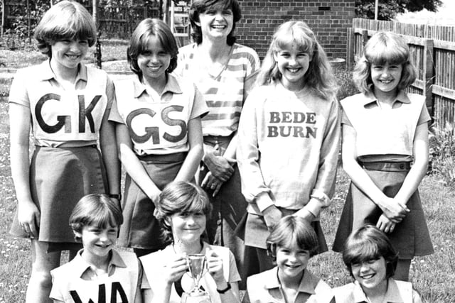 Meet the Bede Burn Junior School netball team with their trophy in 1983. Were you one of the winning players?