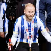 Sheffield Wednesday's Barry Bannan celebrates their promotion to the Sky Bet Championship at Sheffield Town Hall following an open top bus parade. Sheffield Wednesday secured their promotion to the Championship after Josh Windass scored in injury time at the end of extra-time of the play-off final. Picture date: Wednesday May 31, 2023. PA Photo. See PA story SOCCER Sheff Wed. Photo credit should read: Richard Sellers/PA Wire.

RESTRICTIONS: Use subject to restrictions. Editorial use only, no commercial use without prior consent from rights holder.