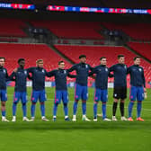 LONDON, ENGLAND - NOVEMBER 12: England players stand for the national anthem during the international friendly match between England and the Republic of Ireland at Wembley Stadium on November 12, 2020 in London, England. Sporting stadiums around the UK remain under strict restrictions due to the Coronavirus Pandemic as Government social distancing laws prohibit fans inside venues resulting in games being played behind closed doors. (Photo by Ben Stansall -
