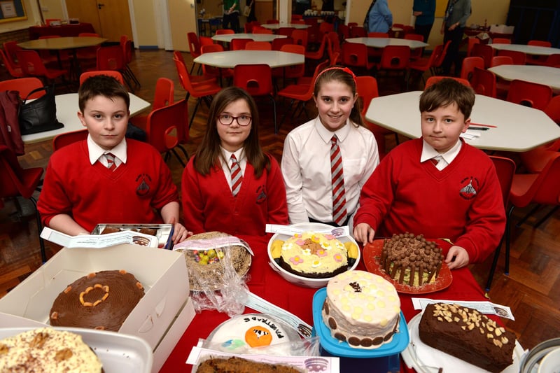 Hayfield Primary held fair trade bake-off competition. Results were being judged by the local W.I. Pupils, from left, with some of the cakes, Ben Wilson, Amelia Barlow, Danielle Fox and Joe Byer, all eleven pictured in 2015