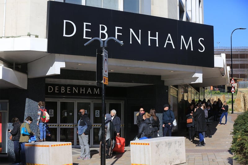 Debenhams sees a long queue outside its store before it reopens