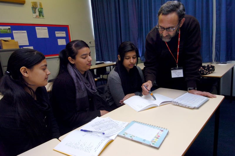 From left, Kashmala Neem, Naila Subhan and Reda Sattar with teacher Inyat Rehman in an Urdu lesson at Abbeydale Grange School in October 2010