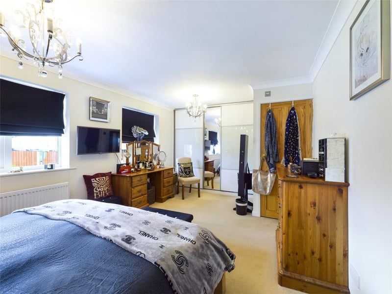 Master bedroom - Two uPVC double glazed windows to the rear elevation, ceiling coving, fitted wardrobe to one wall, T.V point, radiator panel and power points; door to en suite shower room.