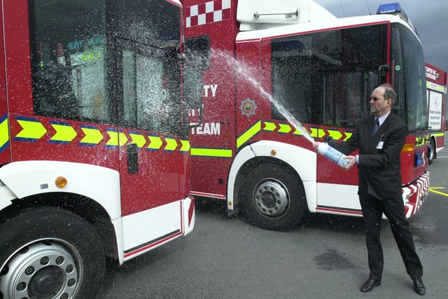 John Freeman, chaplain to the fire service, blessing fire engines during a ceremony at Sheffield City Airport