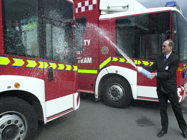 John Freeman, chaplain to the fire service, blessing fire engines during a ceremony at Sheffield City Airport