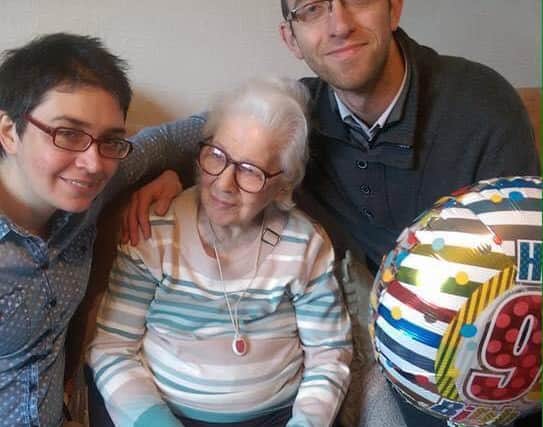 Jessie Madden four years ago on her 90th birthday with her grandchildren, Rebecca and James Bryson