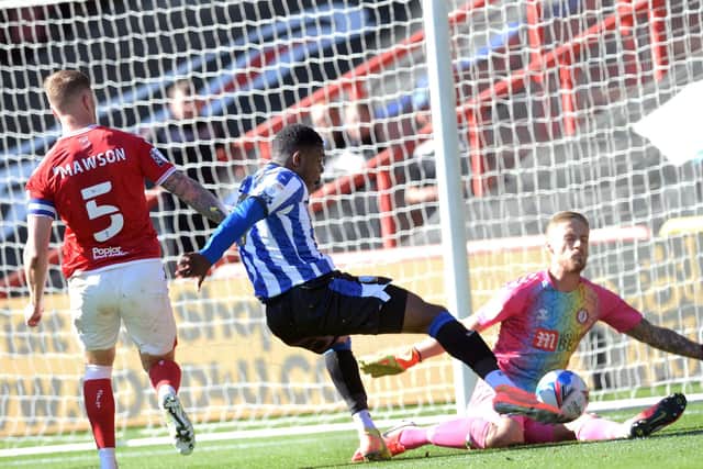 Substitute Fisayo Dele-Bashiru sees a shot blocked by Bristol City keeper Dan Bentley. Picture: Steve Ellis