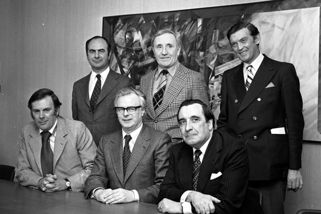 The Scottish Office ministerial team in Edinburgh, April 1976 - l-r back: Harry Ewing (Under-Secretary of State), Frank McElhone, Hugh Brown (Under-Secretary of State). Front l-r: Lord Kirkhill (Minister of State), Bruce Millan (Secretary of State for Scotland),  and Gregor Mackenzie.