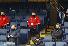 Ethan Ampadu (L) and Chris Basham of Sheffield United sit with Chief Executive Stephen Bettis during the FA Cup match at Stamford Bridge, London. Picture date: 21st March 2021. Picture credit should read: David Klein/Sportimage