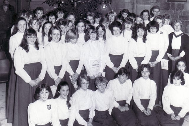 Pictured at the Sheffield Cathedral, where the City of Sheffield Girls' Choir, who won the "Sainsbury's Youth Choir of the Year 1984" competition, gave a concert for Christmas in aid of the NSPCC.  Seen is the Choir in front of the Christmas Tree.
 December 23,  1984