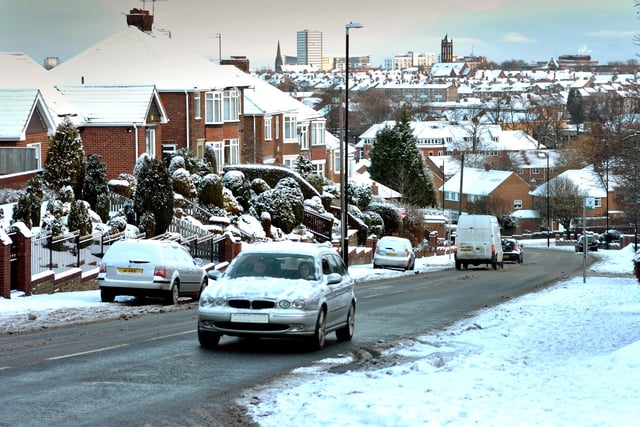 Snow-laden rooftops on this scene from Strawberry Bank, Tunstall Road.