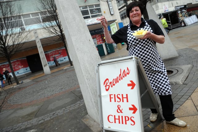Pictured with her sign is Brenda's Chip shop Owner Liz Pearce with her sign on The Moor in 2009