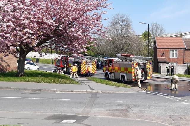 Two people leaped to safety from the upstairs window of a blazing Sheffield flat after a fire broke out today at Firshill Grove, Shirecliffe, near the Sheffield United training ground