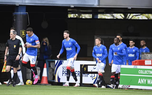 Rangers players enter the pitch during the Scottish Premiership match between Livingston and Rangers at the Tony Macaroni Arena on May 12, 2021, in Livingston, Scotland. (Photo by Rob Casey / SNS Group)