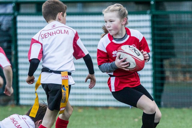 Elsie Crozier playing for Stirches Primary at Hawick's youth rugby festival