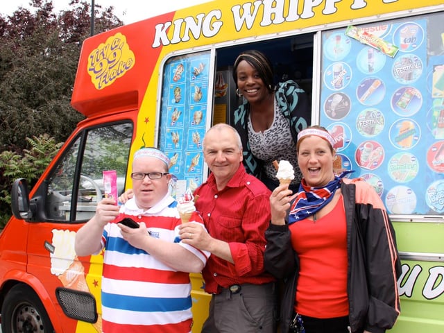 The St Catherine’s site hosted Jubilee-themed celebrations by services, which included a street party for people with learning disabilities in 2012.
Meanwhile, the adult mental health inpatients occupational therapy team held a barbecue for service users, which included games, quizzes and a raffle.
Street party 2: Service user Roy Warrel (left); RDaSH care assistant Jane Ellis (right); RDaSH nursing assistant Kevin Tyler (second from left) with ice cream sales lady Delly Morris (in van) at the RDaSH learning disabilities service Jubilee street party