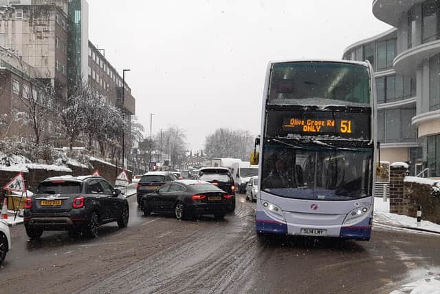 Bus routes and roads have suffered major disruption again today as the snow causes chaos across Sheffield.. This picture shows  a bus on a snowy road in Sheffield yesterday