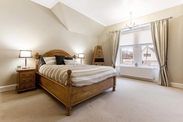 The spacious master bedroom - one of five bedrooms in the property.