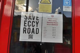 A 'Save Eccy Road' poster at Banner Cross post office on Ecclesall Road - the QR code links to a petition opposing a red line route that would stop customers of businesses parking on the road