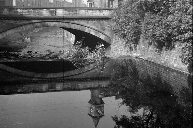 The Water of Leith, crossed by the Stock Bridge, pictured in 1962.