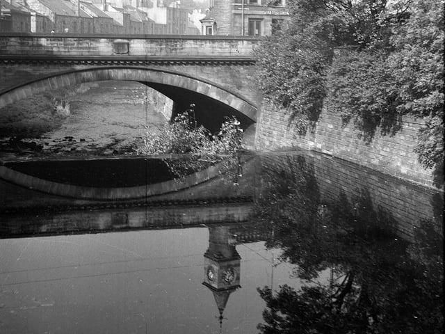 The Water of Leith, crossed by the Stock Bridge, pictured in 1962.