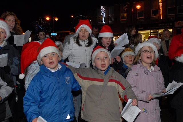 Pupils from the Mapplewells School sing Christmas carols st Sutton light switch on in 2008