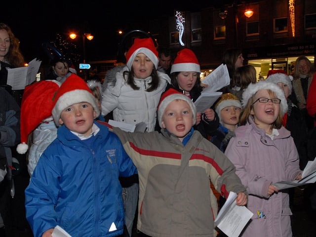 Pupils from the Mapplewells School sing Christmas carols st Sutton light switch on in 2008