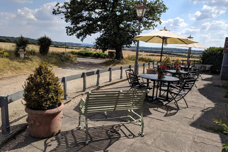 You can’t get more authentic country pub vibes than at the Crab & Boar. With its thatched roof and large outdoor seating space, this relaxing spot is a total gem. Enjoy season British cuisine while gazing out over the fields and beyond. crabandboar.com